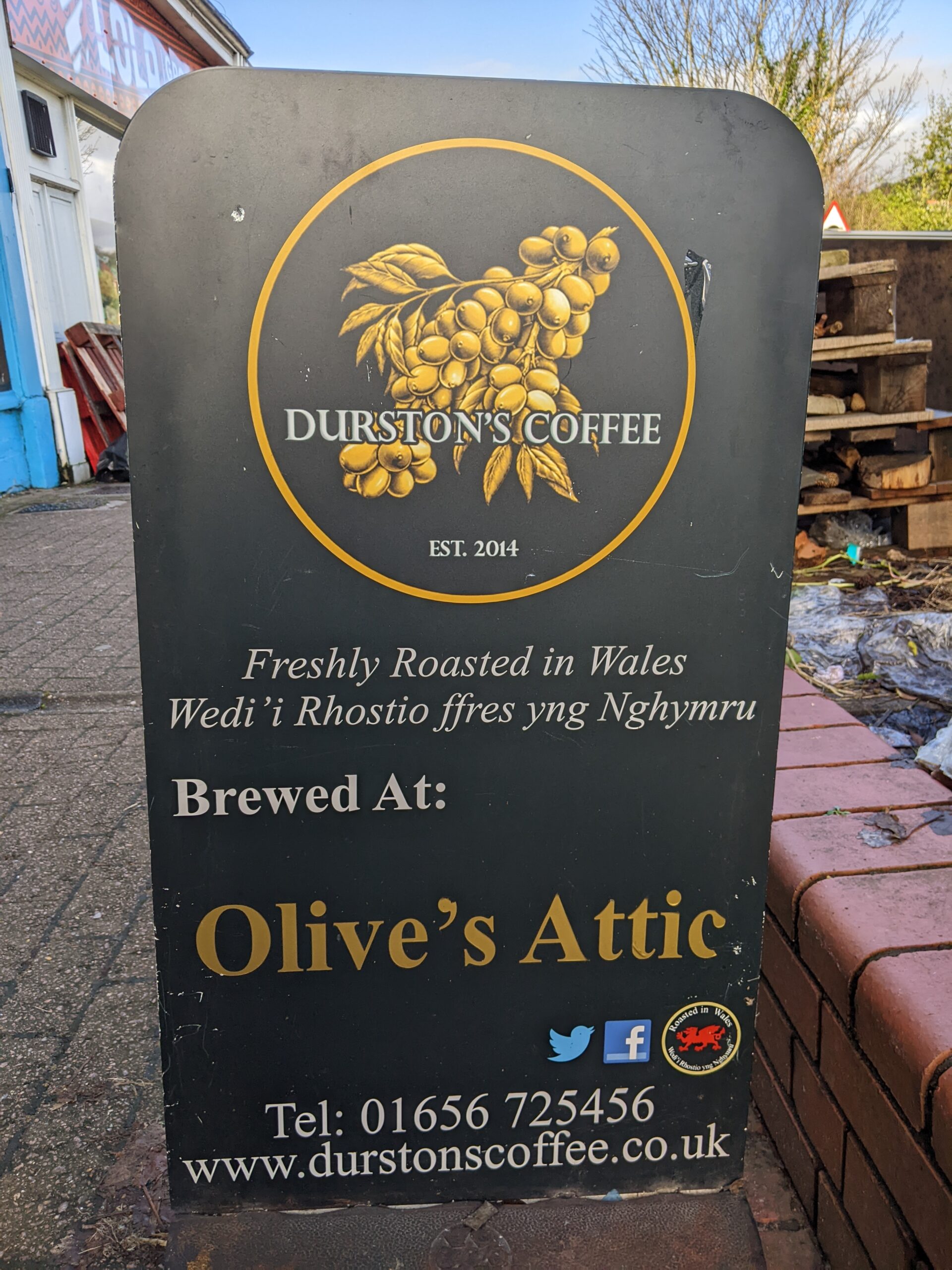 Olive's Attic sign